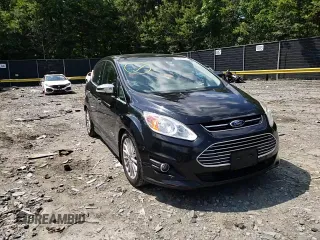2015 Ford C-Max Energi SEL with VIN 1FADP5CU5FL110628, listed as a Copart auction lot 59528463 with 131,414 mi miles. Bid and sale history available at carsss.com. Image 11.