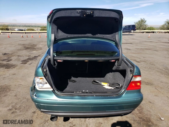 1999 Mercedes-Benz CLK-Class with VIN WDBLJ65G4XF071095, listed as a Copart auction lot 72080064 with 97,558 mi miles and Salvage Title. Bid and sale history available at carsss.com. Image 6.