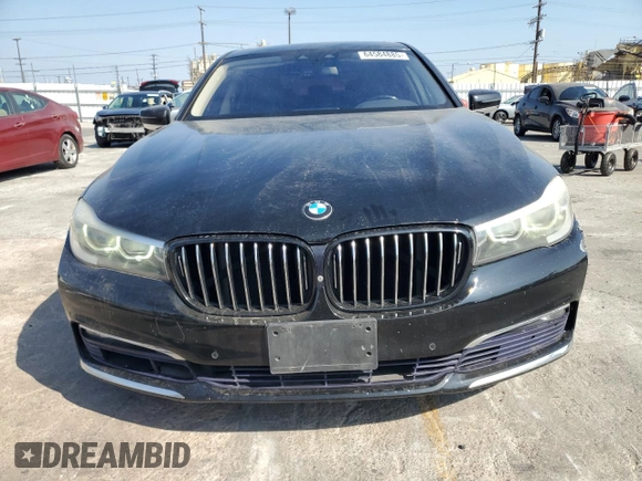 2017 BMW 7 Series 740i with VIN WBA7E2C50HG739565, listed as a Copart auction lot 64584885 with 114,496 mi miles and Salvage title. Bid and sale history available at DreamBid. Image 5.