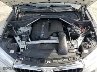 2015 BMW X6 xDrive35i with VIN 5UXKU2C55F0F96006, listed as a Copart auction lot 50830585 with 128,479 mi miles and Salvage Title. Bid and sale history available at carsss.com. Image 12.