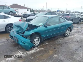 1998 Ford Escort z VIN 3FALP1137WR145199, wystawiony jako IAAI lot #41677279 z przebiegiem 92 232 mil mil oraz . Historia ofert i sprzedaży dostępna na DreamBid. Obrazek 2.