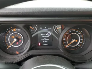 2024 Jeep Wrangler Sport S with VIN 1C4PJXAN5RW123740, listed as a Copart auction lot 62877324 with 5,758 mi miles and Salvage title. Bid and sale history available at DreamBid. Image 9.