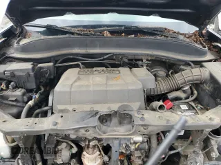 2006 Honda Ridgeline RTL z VIN 2HJYK16586H512708, wystawiony jako Copart lot #59264995 z przebiegiem 208 913 mil mil oraz Tytuł czysty. Historia ofert i sprzedaży dostępna na DreamBid. Obrazek 11.