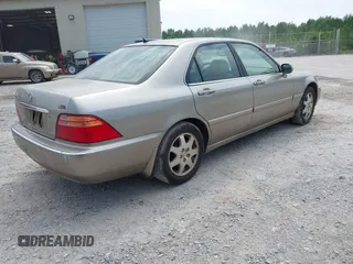 2002 Acura RL z VIN JH4KA96542C001374, wystawiony jako IAAI lot #42425314 z przebiegiem Nie podano mil oraz . Historia ofert i sprzedaży dostępna na DreamBid. Obrazek 4.