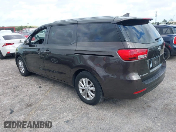 2018 Kia Sedona LX with VIN KNDMB5C15J6382599, listed as a IAAI auction lot 41964769 with 82,494 mi miles. Bid and sale history available at carsss.com. Image 3.