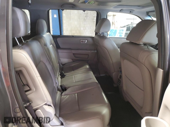 2013 Honda Pilot Touring z VIN 5FNYF3H91DB034638, wystawiony jako Copart lot #59858755 z przebiegiem 115 445 mil mil oraz Szkoda całkowita • Salvage title. Historia ofert i sprzedaży dostępna na DreamBid. Obrazek 11.