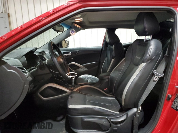 2013 Hyundai Veloster Turbo z VIN KMHTC6AE7DU111060, wystawiony jako Copart lot #57816425 z przebiegiem 140 842 mil mil oraz Szkoda całkowita • Salvage title. Historia ofert i sprzedaży dostępna na DreamBid. Obrazek 7.
