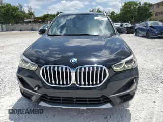 2021 BMW X1 xDrive28i z VIN WBXJG9C08M5T59270, wystawiony jako Copart lot #53894475 z przebiegiem 36 824 mil mil oraz Nie do naprawy • Non repairable. Historia ofert i sprzedaży dostępna na DreamBid. Obrazek 5.