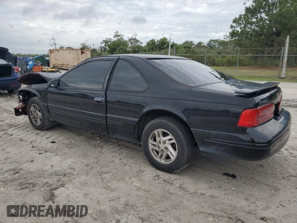 1997 Ford Thunderbird LX z VIN 1FALP62W7VH165149, wystawiony jako Copart lot #56654715 z przebiegiem 155 190 mil mil oraz Szkody całkowita. Historia ofert i sprzedaży dostępna na DreamBid. Obrazek 2.