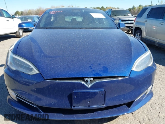 2017 Tesla Model S 60 with VIN 5YJSA1E19HF186227, listed as a IAAI auction lot 41888015 with 105,510 mi miles and . Bid and sale history available at DreamBid. Image 13.