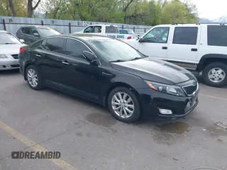2014 Kia Optima EX with VIN 5XXGN4A7XEG300394, listed as a IAAI auction lot 42117331 with 139,986 mi miles and . Bid and sale history available at carsss.com. Image 1.