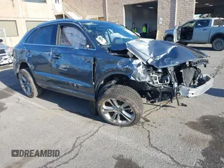2017 Audi Q3 Premium Plus z VIN WA1JCCFS4HR012496, wystawiony jako IAAI lot #41194886 z przebiegiem 67 702 mil mil oraz . Historia ofert i sprzedaży dostępna na DreamBid. Obrazek 1.