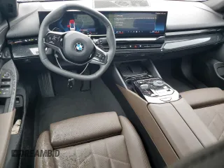 2024 BMW 5 Series 530i xDrive with VIN WBA53FJ01RCP97253, listed as a Copart auction lot 50888795 with 11,985 mi miles and Salvage title. Bid and sale history available at DreamBid. Image 8.