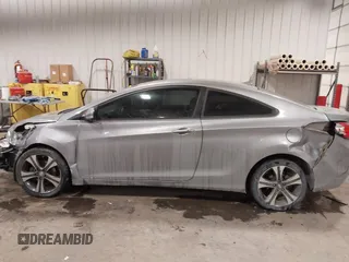 2013 Hyundai Elantra Coupe GS PZEV with VIN KMHDH6AE6DU000893, listed as a IAAI auction lot 41613994 with 94,388 mi miles. Bid and sale history available at carsss.com. Image 15.