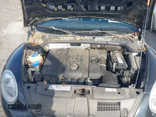 2013 Volkswagen Beetle 2.5L with VIN 3VWJP7AT1DM608370, listed as a IAAI auction lot 42088900 with Not Provided miles and . Bid and sale history available at DreamBid. Image 10.