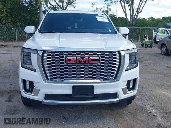 2023 GMC Yukon Denali with VIN 1GKS1DKL2PR303909, listed as a IAAI auction lot 42018679 with 65,532 mi miles. Bid and sale history available at carsss.com. Image 6.