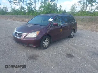 2010 Honda Odyssey EX-L with VIN 5FNRL3H66AB112541, listed as a IAAI auction lot 42137347 with 139,587 mi miles. Bid and sale history available at carsss.com. Image 2.