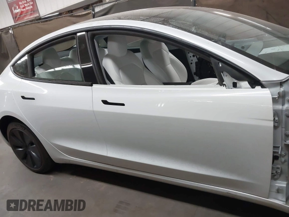 2024 Tesla Model 3 with VIN 5YJ3E1EA9RF836300, listed as a IAAI auction lot 41988009 with 9,989 mi miles. Bid and sale history available at carsss.com. Image 14.
