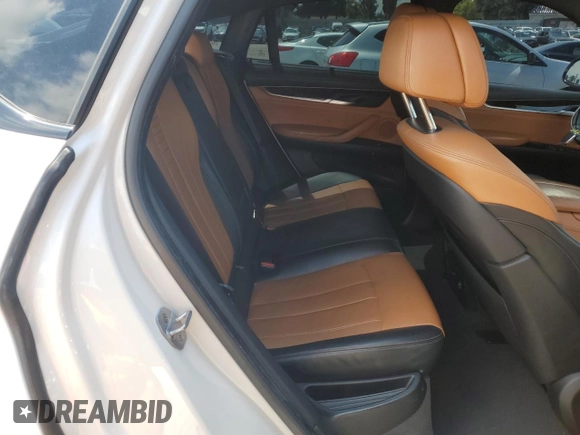 2018 BMW X6 xDrive35i z VIN 5UXKU2C54J0Z62026, wystawiony jako Copart lot #54604165 z przebiegiem 78 581 mil mil oraz Szkoda całkowita • Salvage title. Historia ofert i sprzedaży dostępna na DreamBid. Obrazek 11.