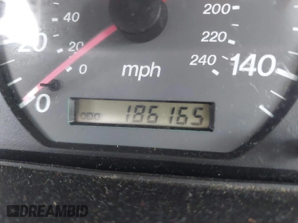 2000 Mazda 626 LX with VIN 1YVGF22C8Y5115891, listed as a IAAI auction lot 42121137 with 186,165 mi miles. Bid and sale history available at carsss.com. Image 7.