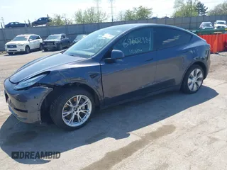 2022 Tesla Model Y Long Range with VIN 7SAYGDEE3NA007737, listed as a IAAI auction lot 42128359 with 42,597 mi miles and . Bid and sale history available at carsss.com. Image 2.
