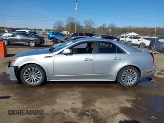 2013 Cadillac CTS Premium with VIN 1G6DP5E39D0100975, listed as a IAAI auction lot 41915113 with 110,436 mi miles and . Bid and sale history available at DreamBid. Image 13.