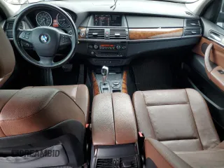 2012 BMW X5 35i z VIN 5UXZV4C59CL758816, wystawiony jako Copart lot #58651965 z przebiegiem 147 365 mil mil oraz Czysty tytuł • Clean title. Historia ofert i sprzedaży dostępna na DreamBid. Obrazek 8.