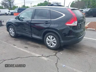 2013 Honda CR-V EX-L with VIN 2HKRM3H77DH503712, listed as a IAAI auction lot 41952997 with 126,432 mi miles and . Bid and sale history available at DreamBid. Image 3.