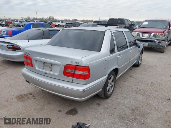 1999 Volvo S70 z VIN YV1LS55A1X1602832, wystawiony jako IAAI lot #41419464 z przebiegiem 243 610 mil mil oraz . Historia ofert i sprzedaży dostępna na DreamBid. Obrazek 4.