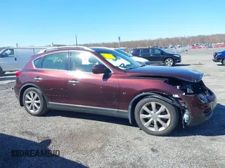 2015 Infiniti QX50 z VIN JN1BJ0HR7FM773643, wystawiony jako IAAI lot #41825903 z przebiegiem 68 488 mil mil oraz . Historia ofert i sprzedaży dostępna na DreamBid. Obrazek 13.