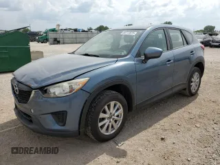 2015 Mazda CX-5 Sport with VIN JM3KE2BE8F0434116, listed as a Copart auction lot 60712625 with 300,405 mi miles and Salvage title. Bid and sale history available at DreamBid. Image 1.