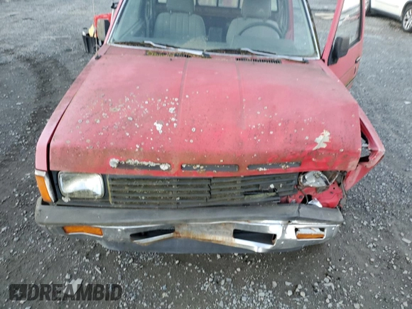 1986 Nissan Hardbody z VIN 1N6HD16S3GC426938, wystawiony jako Copart lot #79319484 z przebiegiem 186 368 mil mil oraz Szkoda całkowita • Salvage title. Historia ofert i sprzedaży dostępna na DreamBid. Obrazek 12.