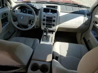 2010 Mercury Mariner z VIN 4M2CN8B71AKJ14578, wystawiony jako Copart lot #53035565 z przebiegiem 160 525 mil mil oraz Szkody całkowita. Historia ofert i sprzedaży dostępna na DreamBid. Obrazek 8.