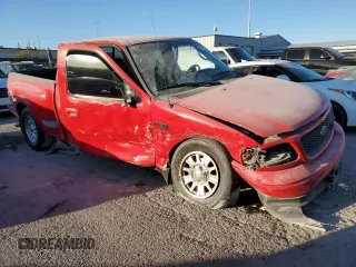 2002 Ford F-150 XL with VIN 1FTRX07W22KA41637, listed as a Copart auction lot 43665235 with 277,896 mi miles and Salvage title. Bid and sale history available at DreamBid. Image 4.