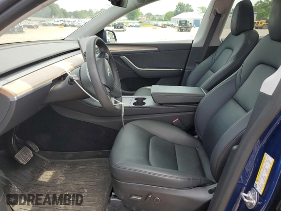 2024 Tesla Model Y Long Range z VIN 7SAYGDEE8RA248635, wystawiony jako Copart lot #59130125 z przebiegiem 21 210 mil mil oraz Szkoda całkowita • Salvage title. Historia ofert i sprzedaży dostępna na DreamBid. Obrazek 7.