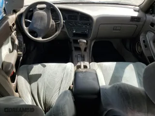 1993 Toyota Camry LE with VIN JT2SK12E4P0112014, listed as a Copart auction lot 52822095 with 249,458 mi miles and Salvage Title. Bid and sale history available at carsss.com. Image 8.