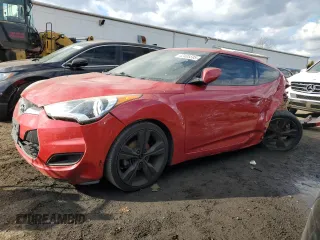 2013 Hyundai Veloster w/Gray Int with VIN KMHTC6AD1DU144742, listed as a Copart auction lot 42485595 with 136,073 mi miles and Salvage Title. Bid and sale history available at carsss.com. Image 1.
