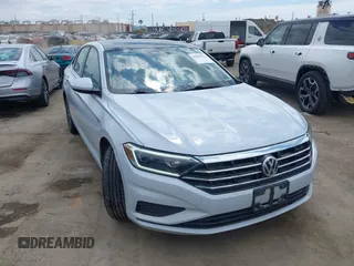2019 Volkswagen Jetta SEL z VIN 3VWE57BUXKM063071, wystawiony jako IAAI lot #42058223 z przebiegiem 96 597 mil mil oraz . Historia ofert i sprzedaży dostępna na DreamBid. Obrazek 1.