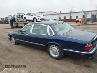 1998 Jaguar XJ Vanden Plas with VIN SAJKX6246WC832202, listed as a IAAI auction lot 41218807 with 96,589 mi miles and . Bid and sale history available at DreamBid. Image 3.