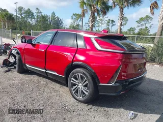 2024 Cadillac LYRIQ Luxury z VIN 1GYKPRRKXRZ137625, wystawiony jako IAAI lot #41570493 z przebiegiem 3 859 mil mil oraz . Historia ofert i sprzedaży dostępna na DreamBid. Obrazek 3.