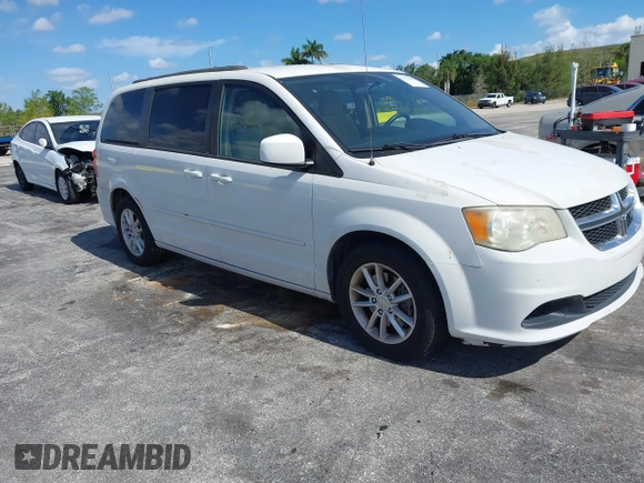 2014 Dodge Grand Caravan SXT with VIN 2C4RDGCGXER322705, listed as a IAAI auction lot 42170301 with 147,070 mi miles and . Bid and sale history available at DreamBid. Image 1.