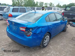 2021 Subaru Impreza with VIN 4S3GKAB6XM3607348, listed as a IAAI auction lot 42554219 with 38,722 mi miles and . Bid and sale history available at DreamBid. Image 4.