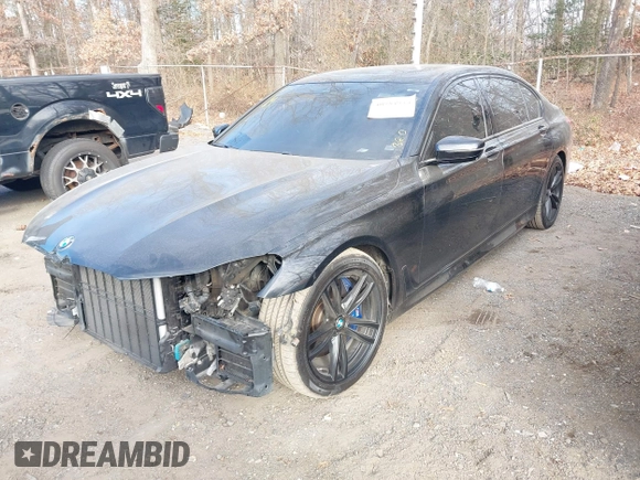 2019 BMW 7 Series 750i xDrive with VIN WBA7F2C52KB240302, listed as a IAAI auction lot 40984933 with 93,737 mi miles and . Bid and sale history available at DreamBid. Image 17.