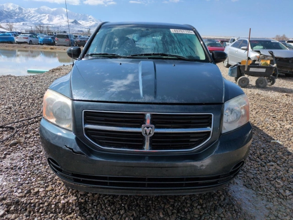 2008 Dodge Caliber SXT with VIN 1B3HB48B58D582130, listed as a Copart auction lot 49707155 with 155,347 mi miles and Salvage Title. Bid and sale history available at DreamBid. Image 5.