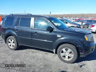 2011 Honda Pilot EX-L with VIN 5FNYF4H65BB004213, listed as a IAAI auction lot 41867681 with 157,644 mi miles and . Bid and sale history available at carsss.com. Image 13.