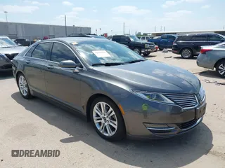 2015 Lincoln MKZ z VIN 3LN6L2GK4FR622805, wystawiony jako IAAI lot #42054182 z przebiegiem 68 276 mil mil oraz . Historia ofert i sprzedaży dostępna na DreamBid. Obrazek 1.