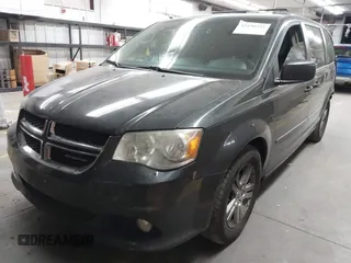 2011 Dodge Grand Caravan Crew with VIN 2D4RN5DG9BR683020, listed as a IAAI auction lot 42150221 with 200,730 mi miles and . Bid and sale history available at DreamBid. Image 2.