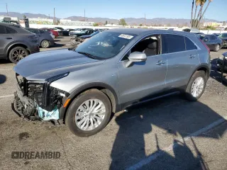 2024 Cadillac XT4 AWD Luxury with VIN 1GYFZBR40RF150020, listed as a Copart auction lot 88341385 with 9,188 mi miles and Salvage Title. Bid and sale history available at carsss.com. Image 1.