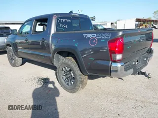2017 Toyota Tacoma SR5 with VIN 5TFCZ5AN5HX077315, listed as a IAAI auction lot 42017639 with 74,999 mi miles and . Bid and sale history available at DreamBid. Image 3.