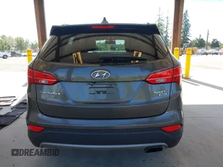 2014 Hyundai Santa Fe z VIN 5XYZUDLB0EG187192, wystawiony jako IAAI lot #42360255 z przebiegiem 154 607 mil mil oraz . Historia ofert i sprzedaży dostępna na DreamBid. Obrazek 16.